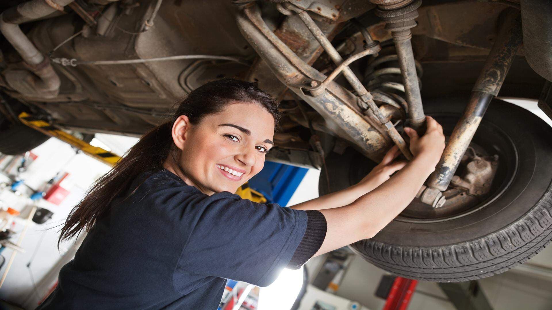 1930237-portrait-of-smiling-young-female-mechanic.jpg