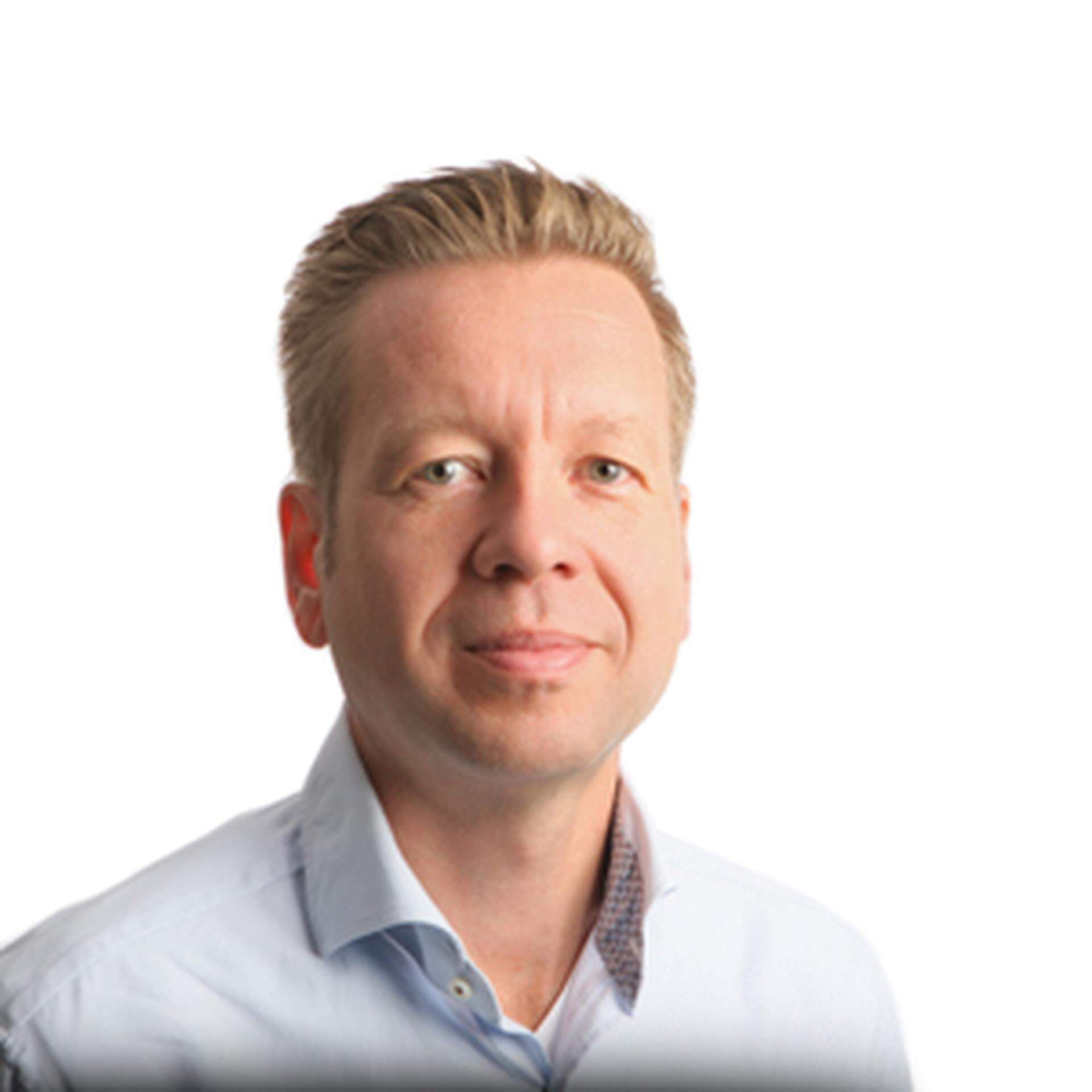 Håkan Düring i ljusblå skjorta