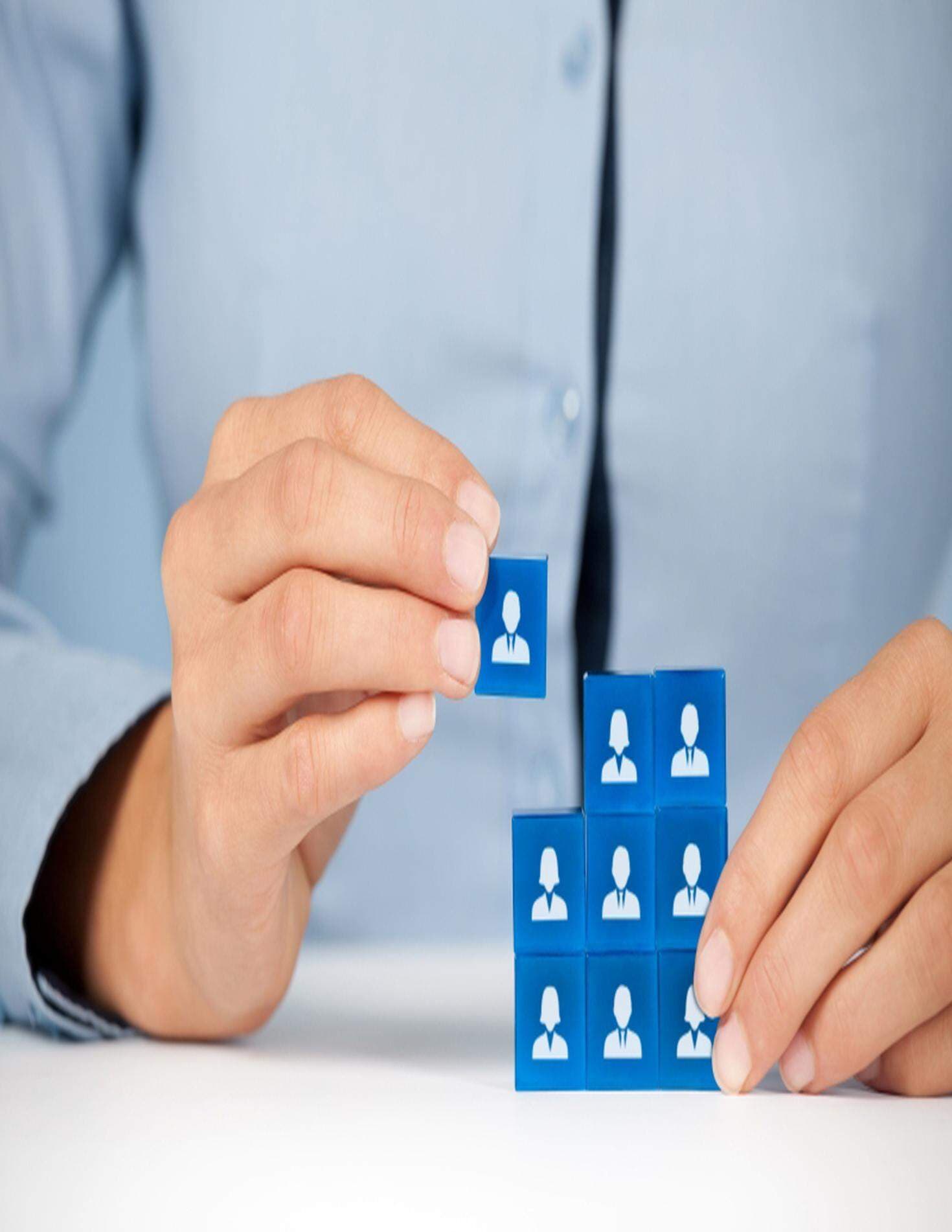 klossar med ikoner av människor