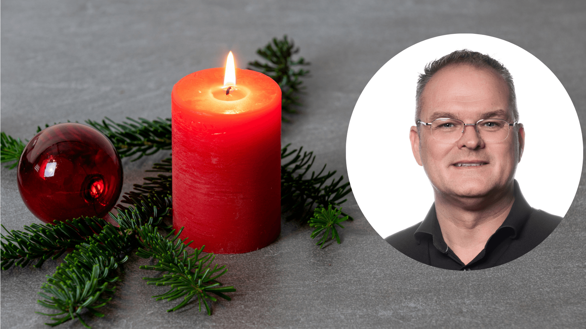 Julkula, brinnande ljus och en porträttbild på Ola Toftegaard