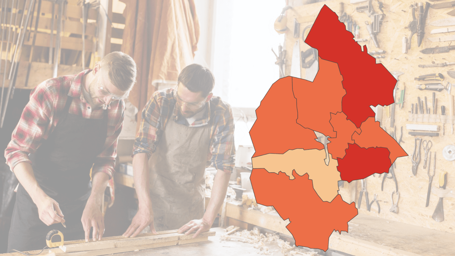 Två män står och arbetar vid en bänk och på sidan är en karta över Jämtlands län.