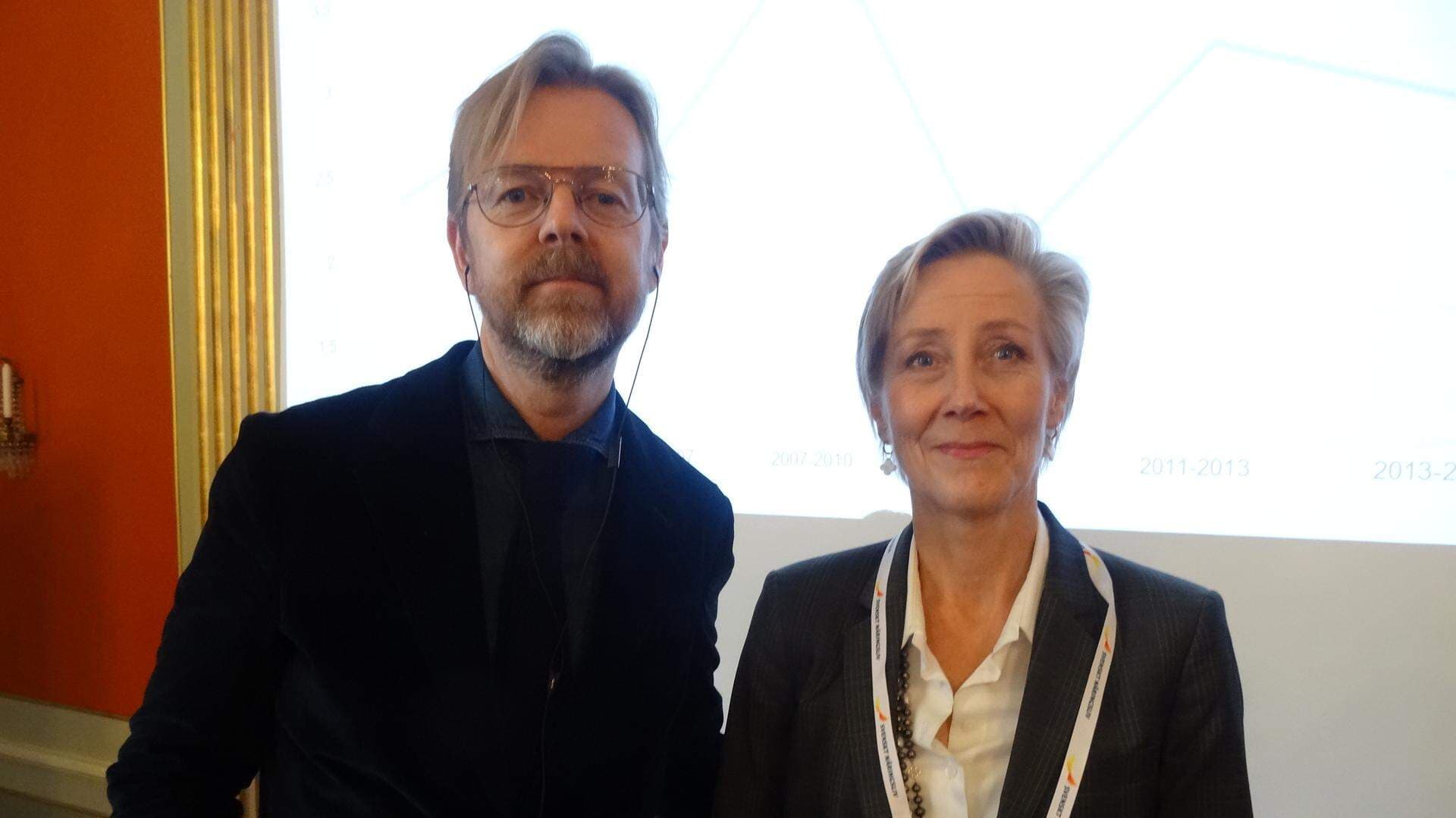 Två personer i halvfigur
