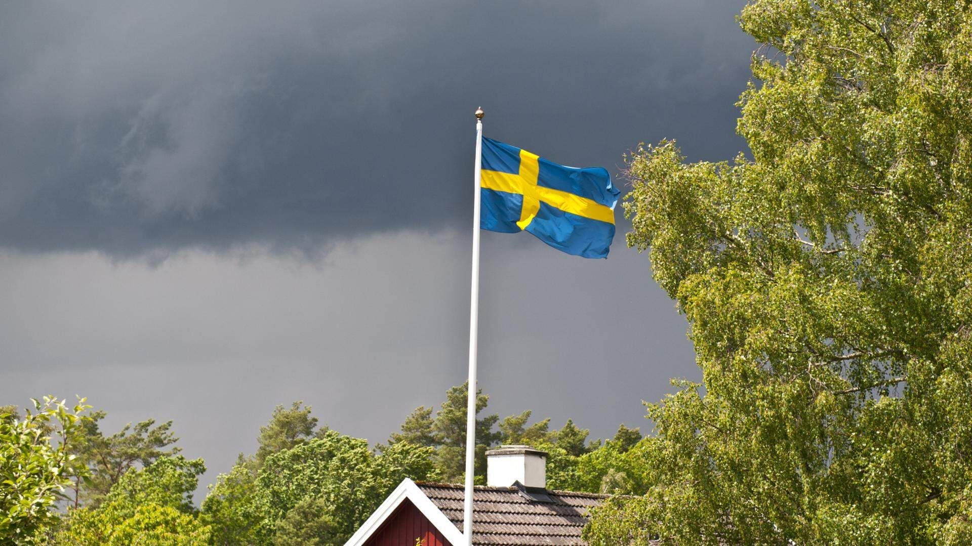 Mulen himmel och svenska flaggan