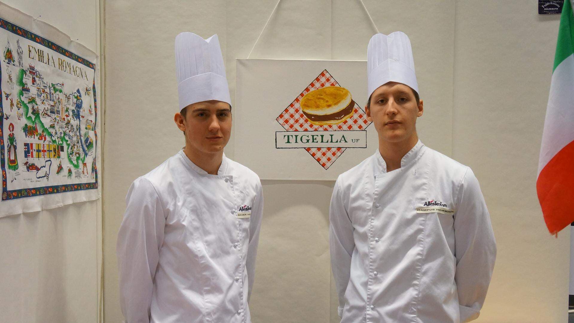 Oscar och Hampus står och serverar nybakat bröd med olika sorters fyllning