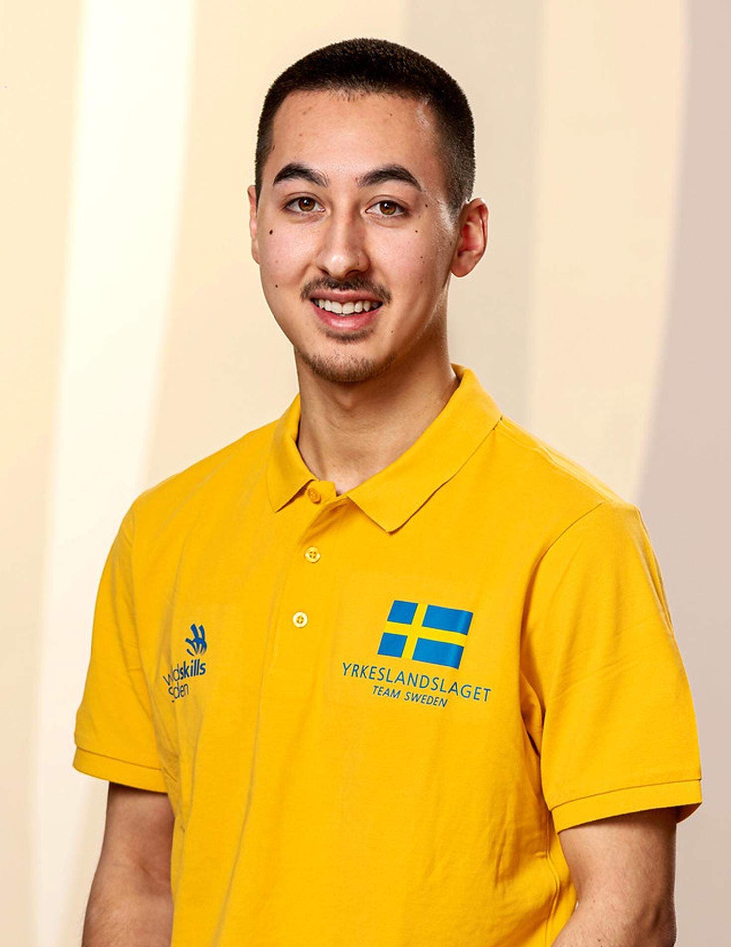 Bilden är ett porträtt av Arvid Winberg i landslagströja.