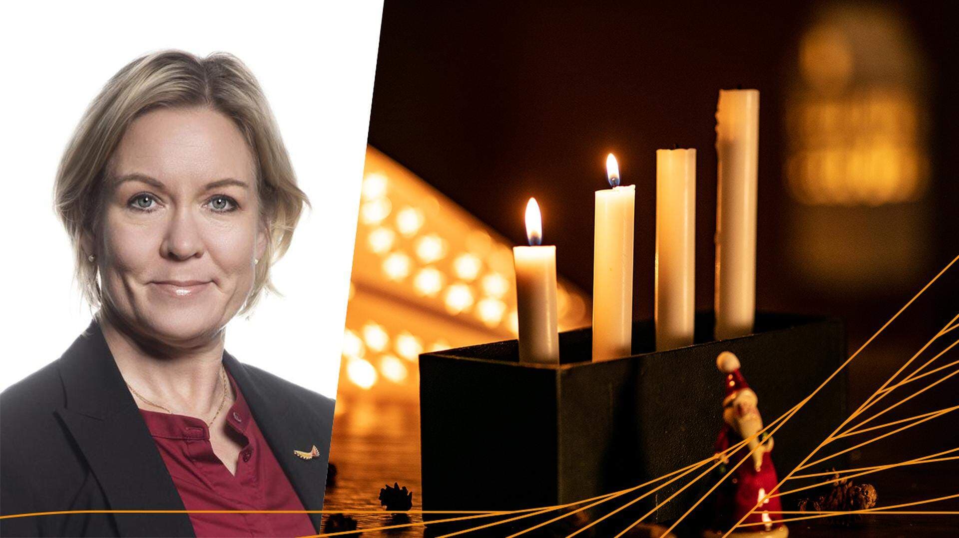 Anna Hedensjö Johansson och en adventsstake där två ljus brinner